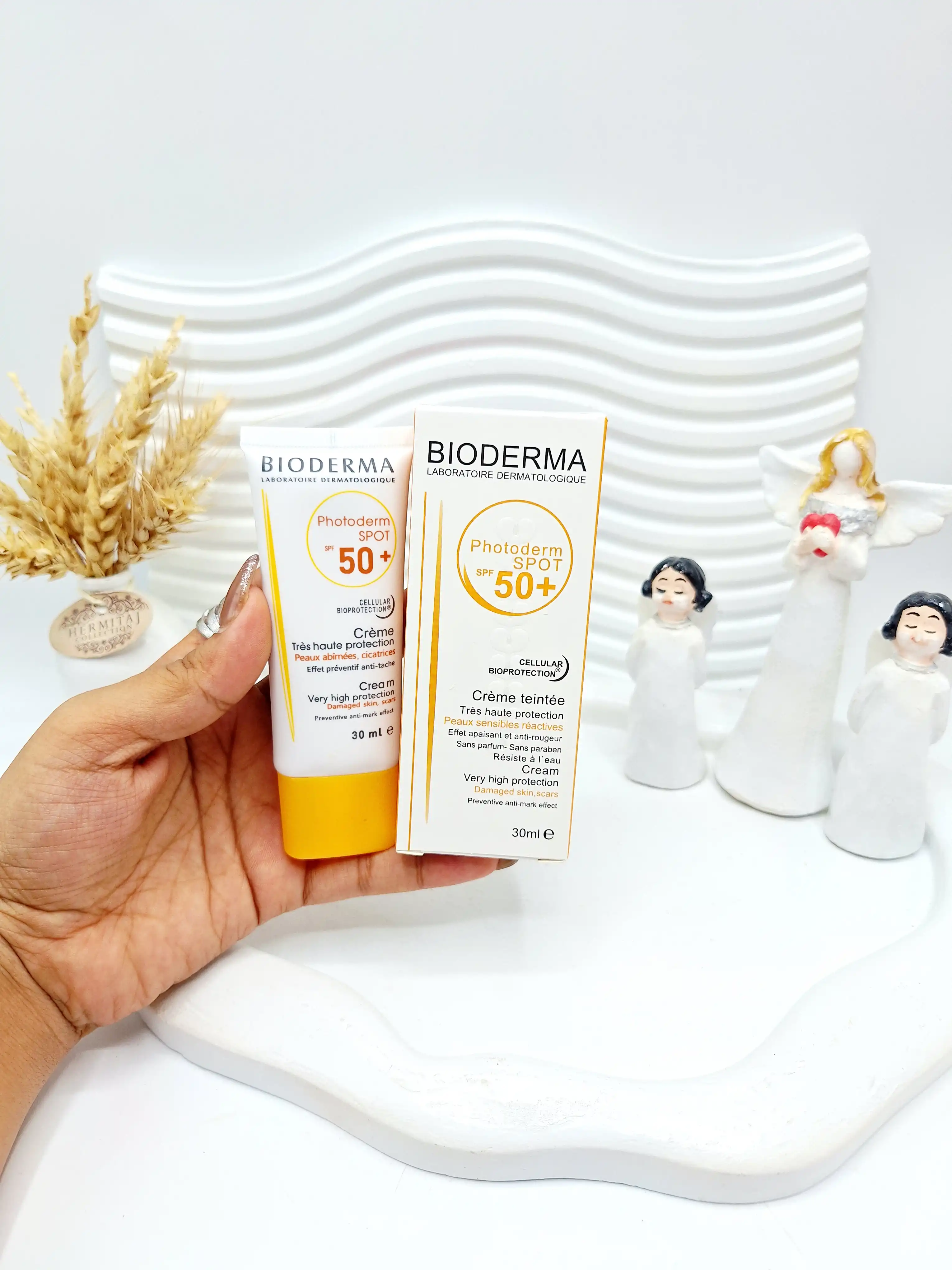کرم ضد آفتاب رنگی SPF50 بیودرما کد 9159 BIODERMA