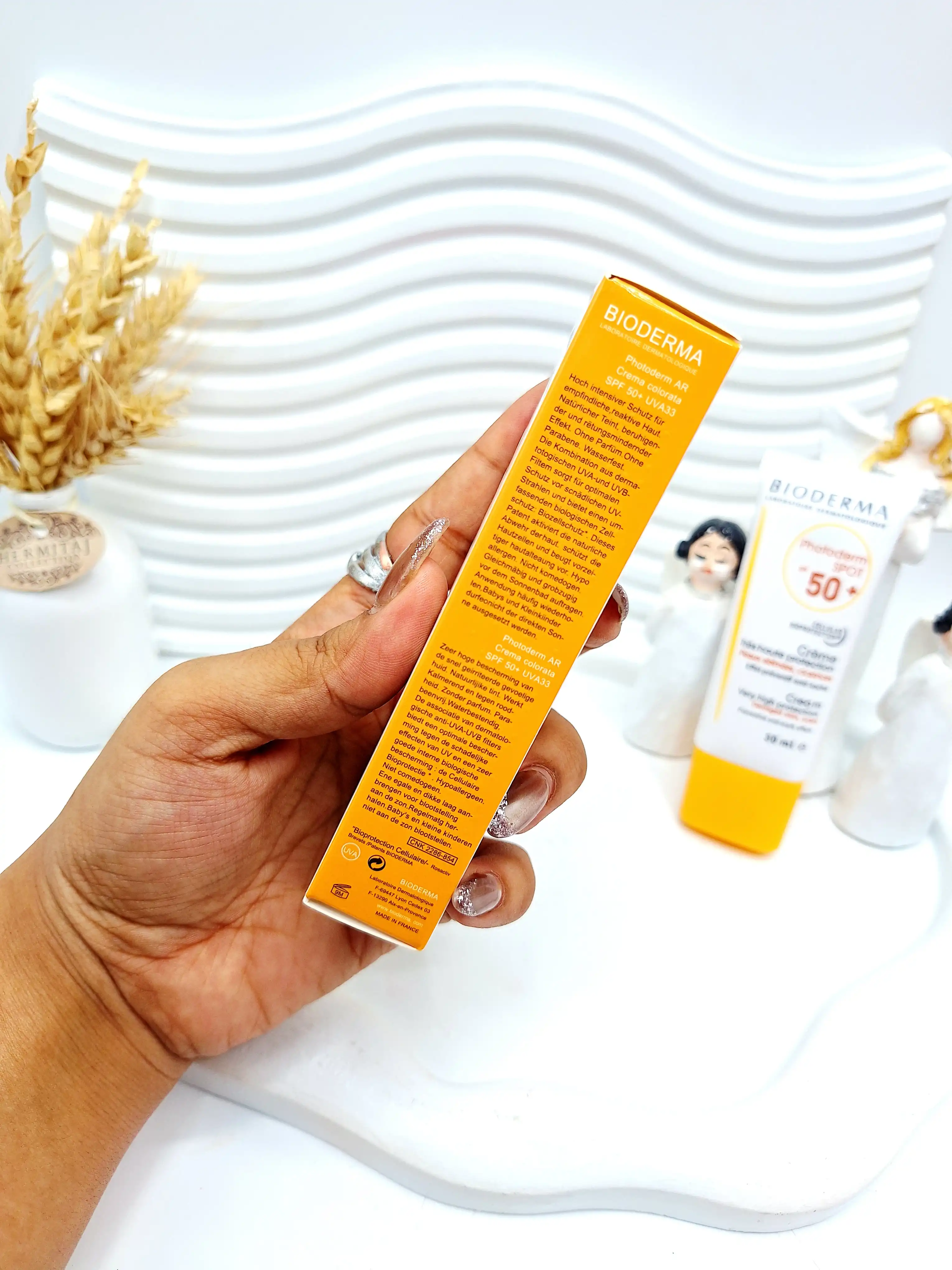 کرم ضد آفتاب رنگی SPF50 بیودرما کد 9159 BIODERMA